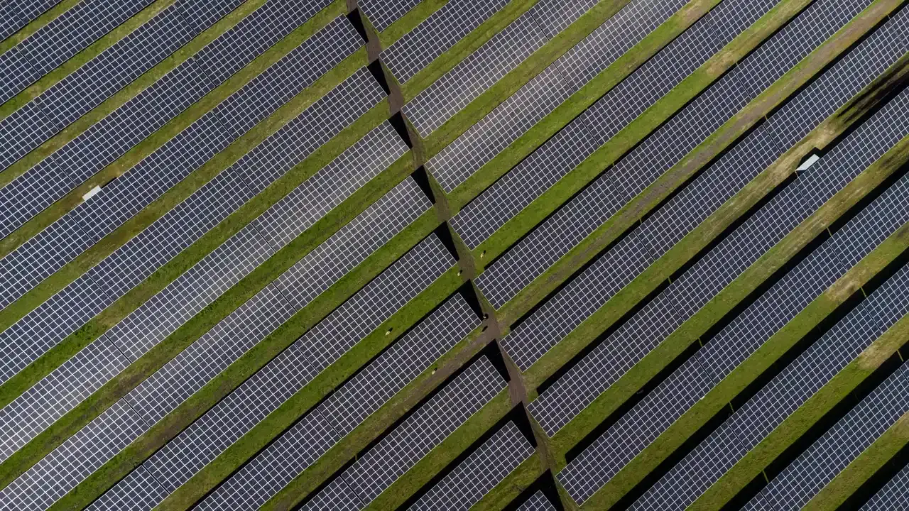 Aerial view of a community solar array in agricultural land